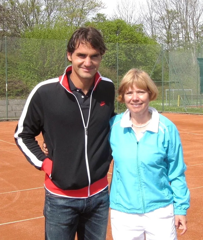 Roger Federer mit einem Clubmitglied